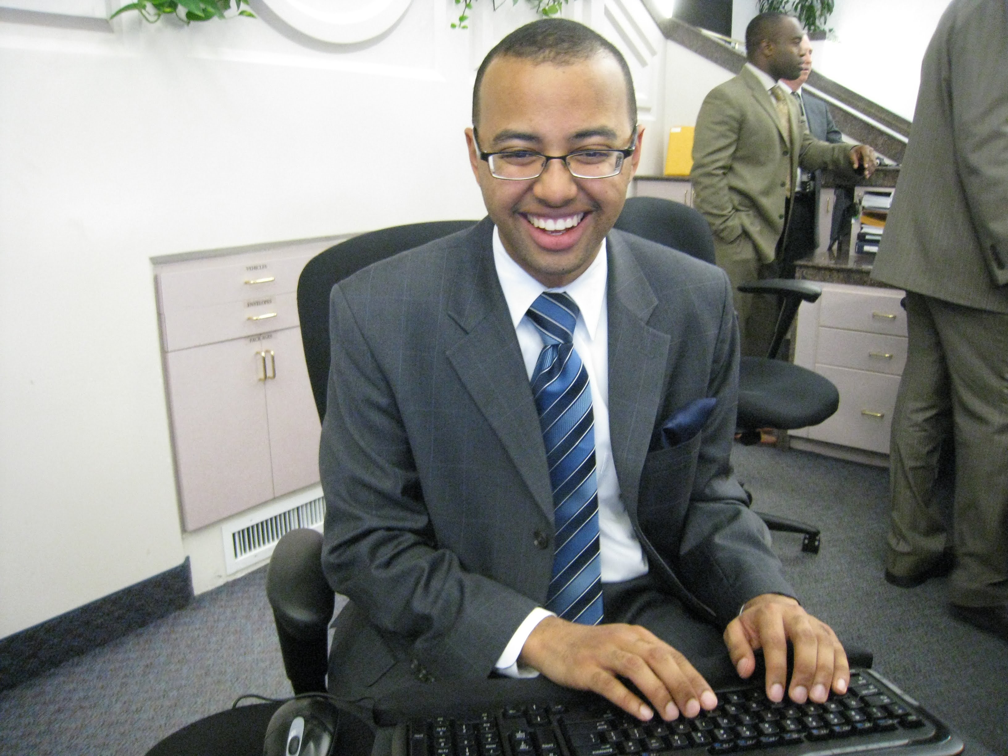Brandon at an early-career operations desk.